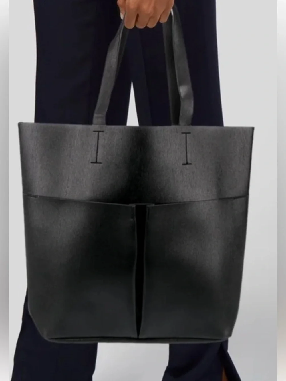 Neiman Marcus black faux leather tote bag with front pockets